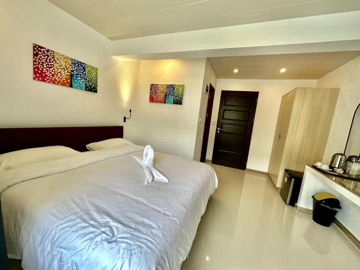 Calypso Beach And Dive Resort Manoc-Manoc ภายนอก รูปภาพ