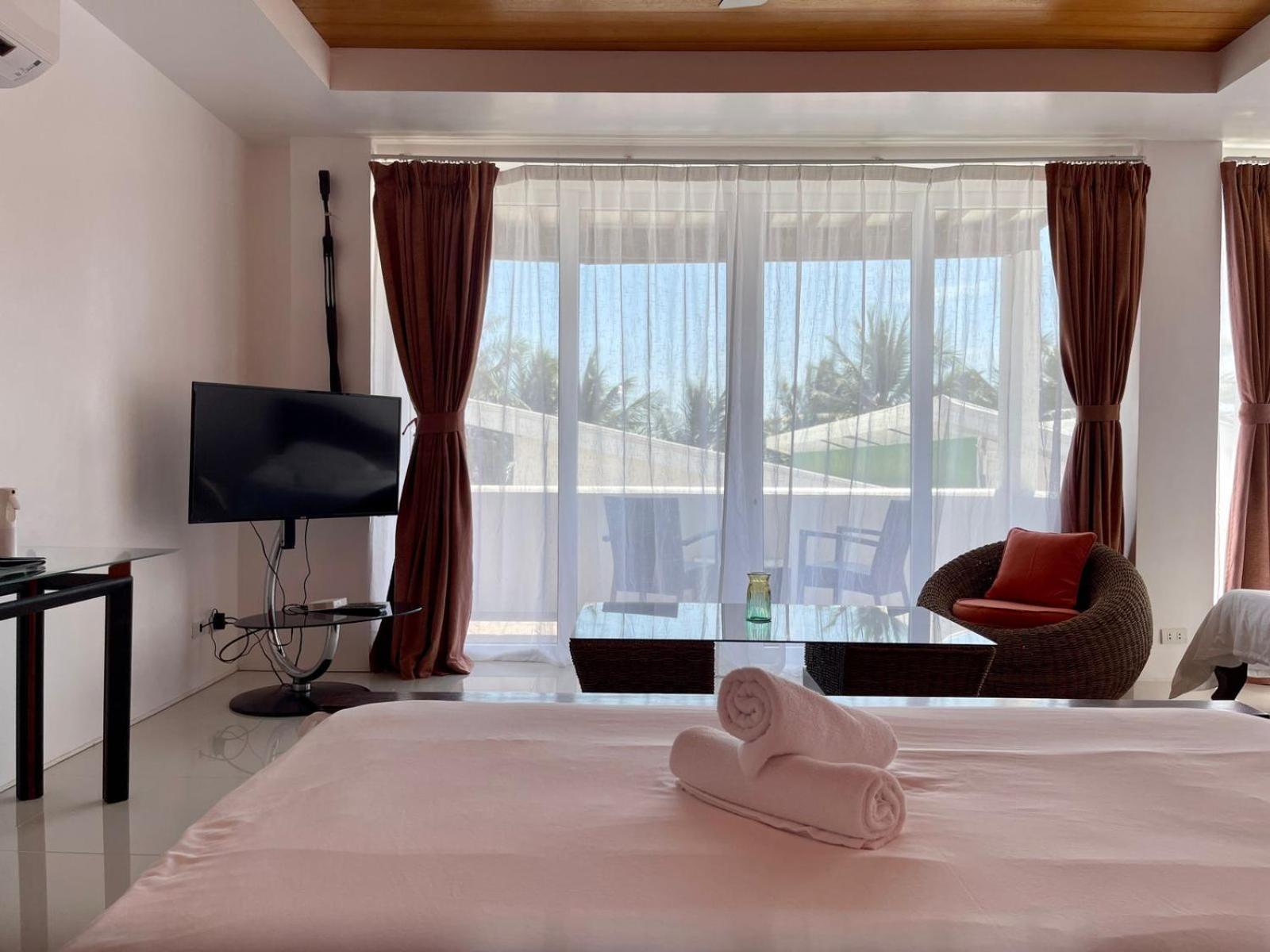 Calypso Beach And Dive Resort Manoc-Manoc ภายนอก รูปภาพ