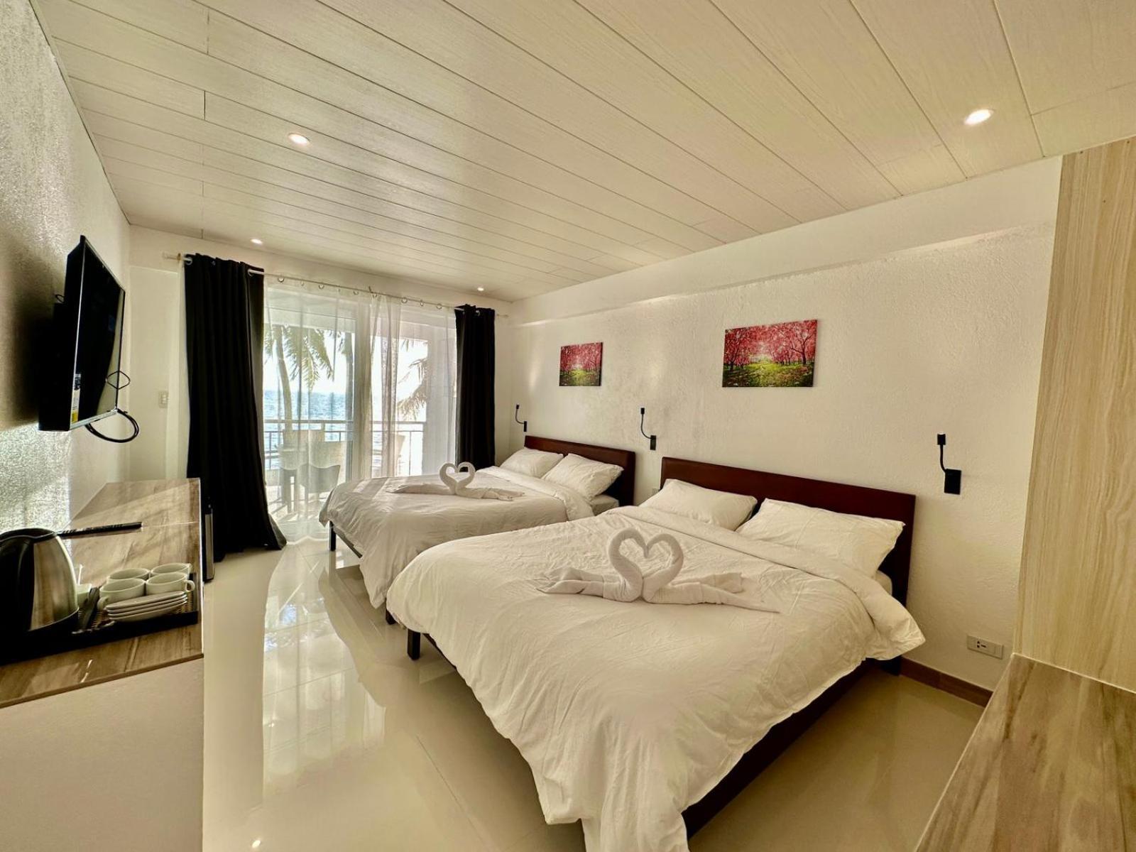 Calypso Beach And Dive Resort Manoc-Manoc ภายนอก รูปภาพ