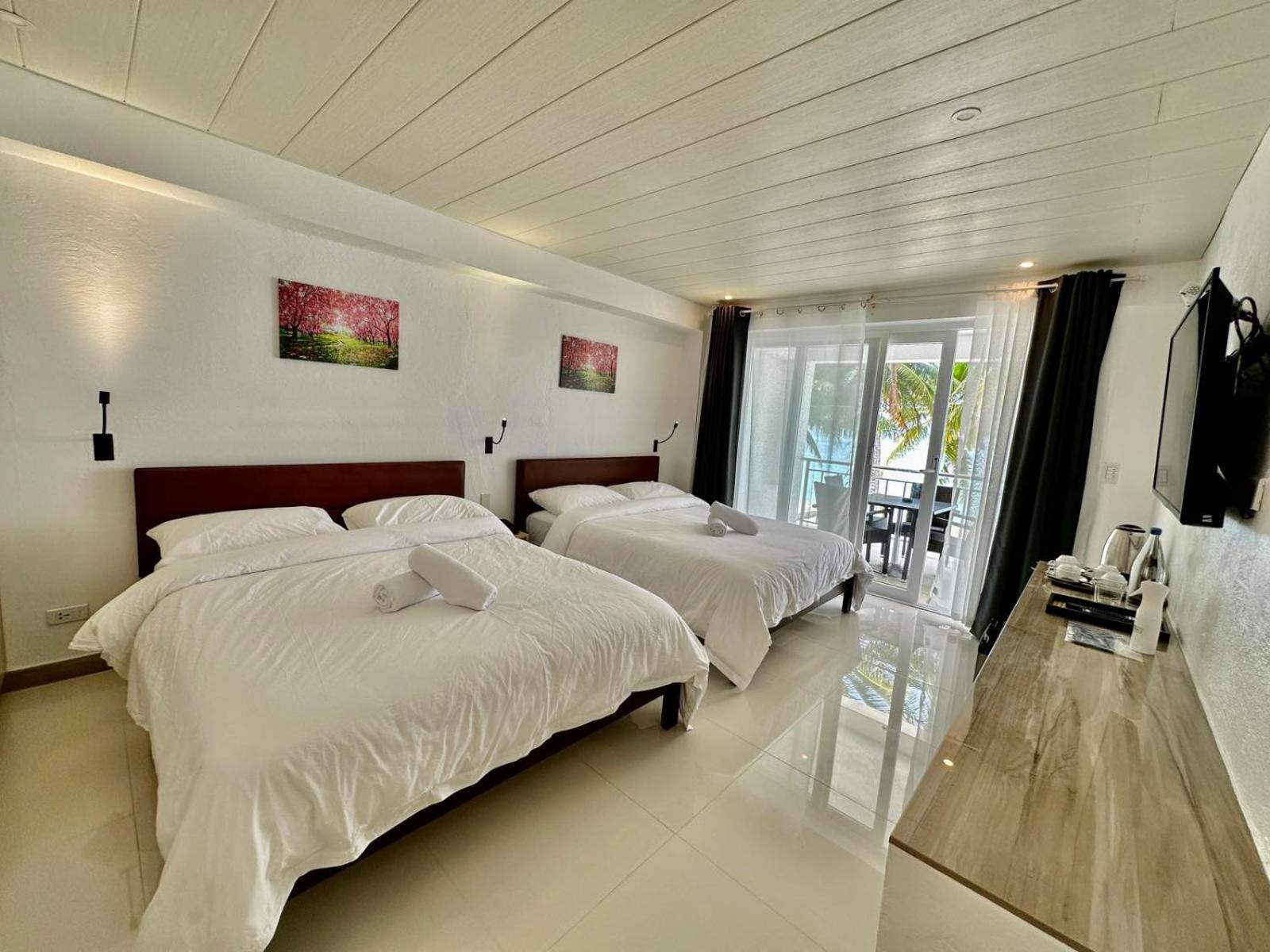 Calypso Beach And Dive Resort Manoc-Manoc ภายนอก รูปภาพ