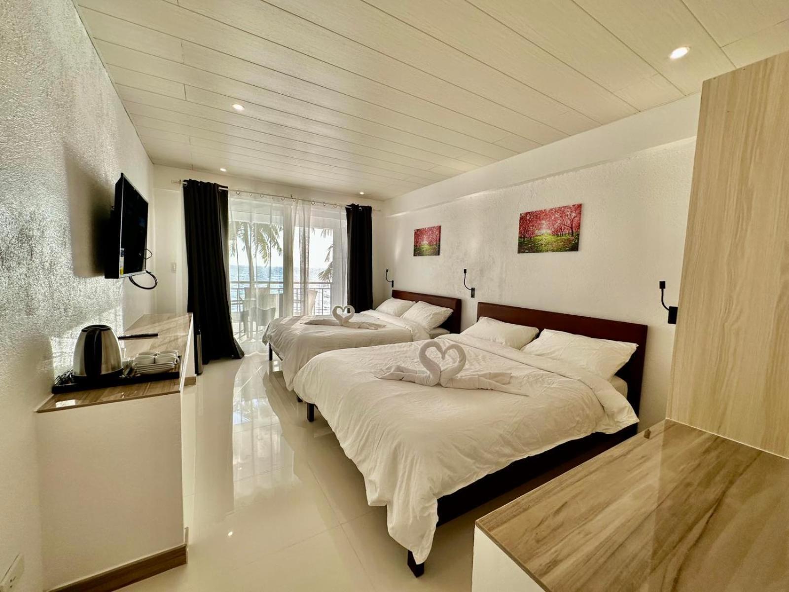 Calypso Beach And Dive Resort Manoc-Manoc ภายนอก รูปภาพ