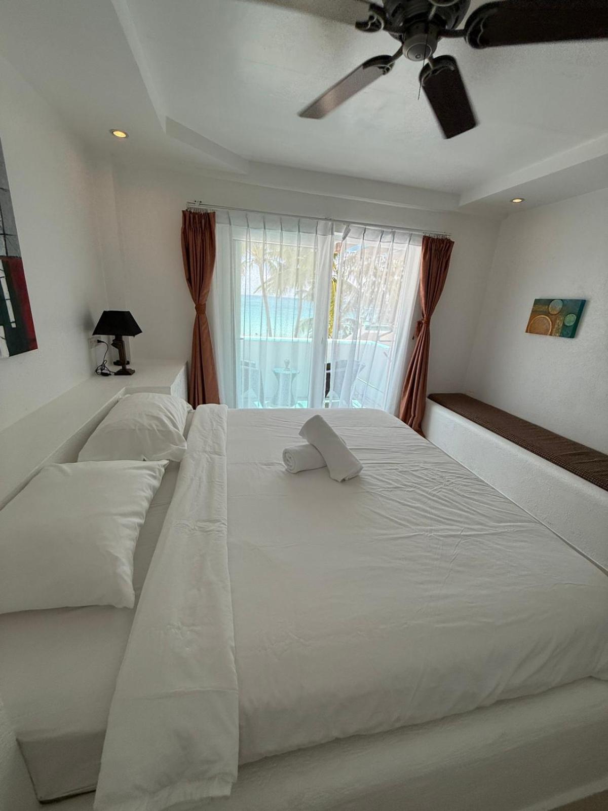 Calypso Beach And Dive Resort Manoc-Manoc ภายนอก รูปภาพ