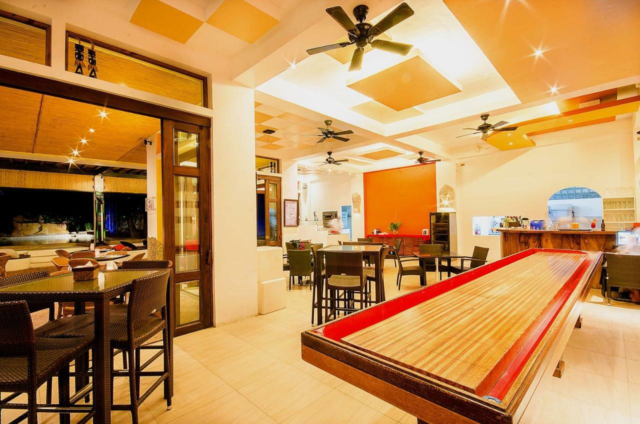 Calypso Beach And Dive Resort Manoc-Manoc ภายนอก รูปภาพ