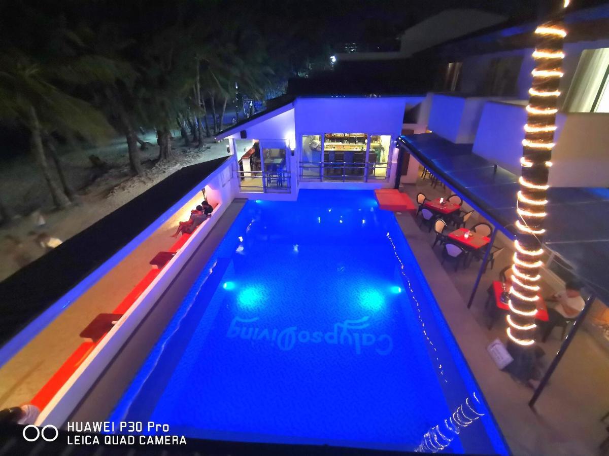 Calypso Beach And Dive Resort Manoc-Manoc ภายนอก รูปภาพ
